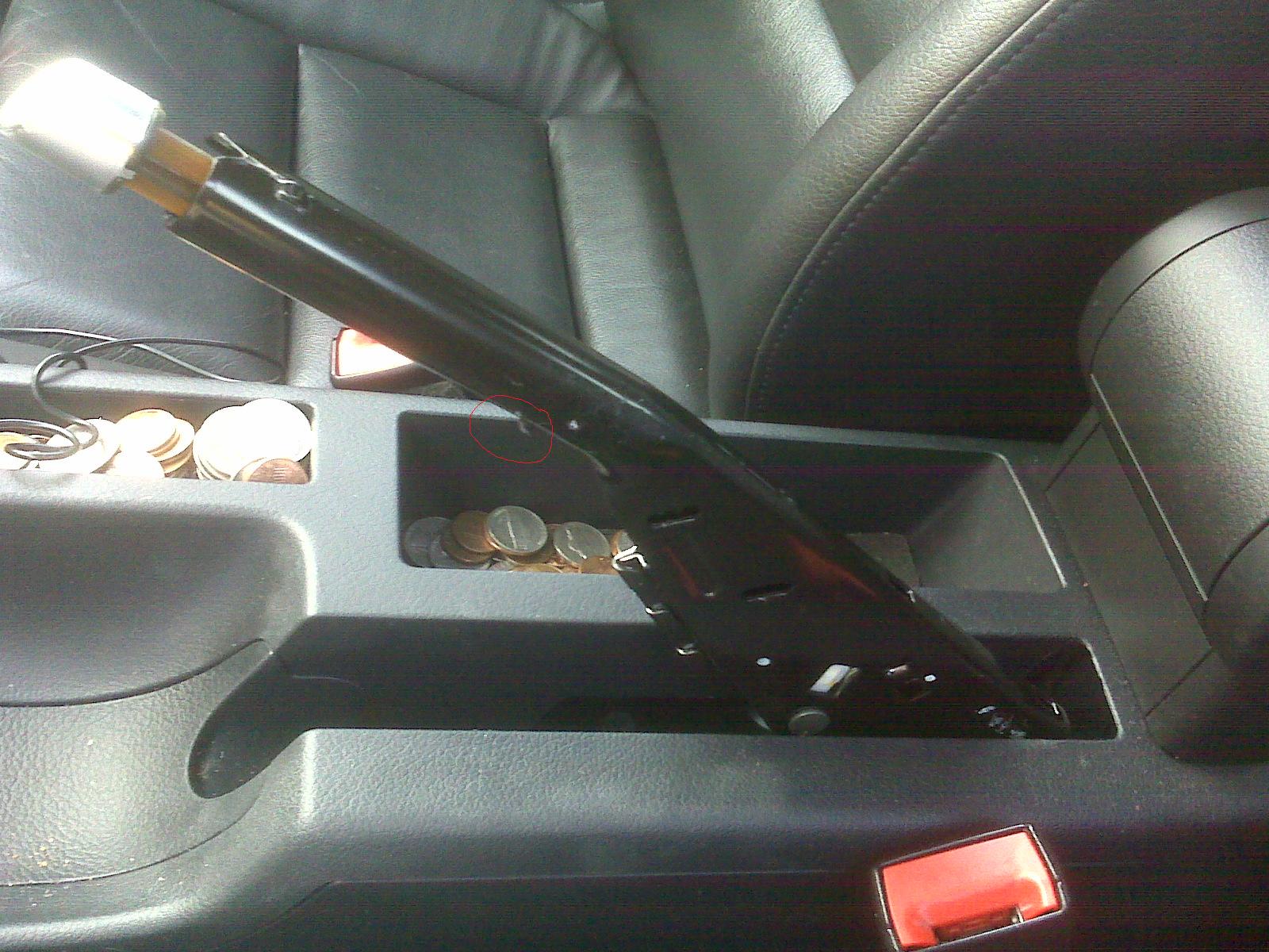 How do you remove the handbrake handle?