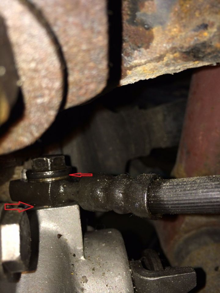 Crush washers around bolt on rear caliper making caliper leak.